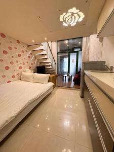 Postel nebo postele na pokoji v ubytování 少雅湯宿