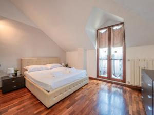Ένα ή περισσότερα κρεβάτια σε δωμάτιο στο I-Host Apartment - Rogoredo 21