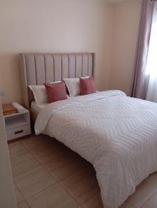 Postel nebo postele na pokoji v ubytování Caykal luxury homes