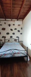 Postel nebo postele na pokoji v ubytování "VILLA SERVANDA" - Casa Canaria construida a PRINCIPIOS DEL SIGLO XIX