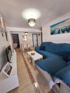 Μια τηλεόραση ή/και κέντρο ψυχαγωγίας στο Apartamento Alfonso Barbate