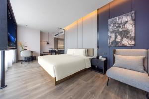 TV a/nebo společenská místnost v ubytování Atour Hotel Shantou Chenghai Guosheng Center