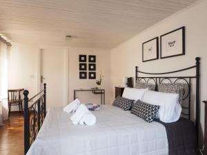 A bed or beds in a room at Domus Tua