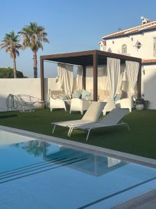 a rendering of a villa with a swimming pool at Chalet con vistas al atlantico in Palos de la Frontera