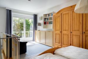 En eller flere senge i et værelse på PAR7b "Haus Miramar" App Rothmund