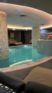 a large swimming pool in a hotel room at Miapera Hotel & Spa - Special Class in Istanbul