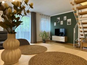Televisyen dan/atau pusat hiburan di Ferienwohnung FüssenPur