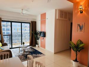 TV a/nebo společenská místnost v ubytování Mocha Private 1 5 BHK Apt Amanora Park Town