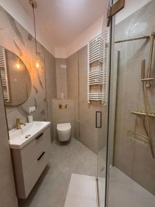 Koupelna v ubytování Apartament Mazurski