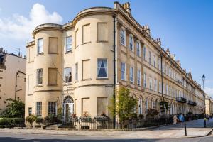 a large building on the side of a street at Dukes Bath in Bath