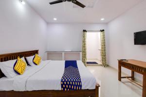 Katil atau katil-katil dalam bilik di Hotel O Hills Land +30 gambar