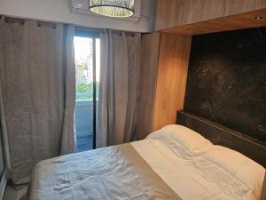 Ένα ή περισσότερα κρεβάτια σε δωμάτιο στο Manantial de armonia