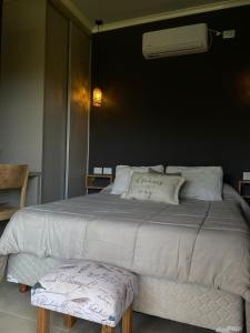 Ένα ή περισσότερα κρεβάτια σε δωμάτιο στο La Justina MINI PISCINA