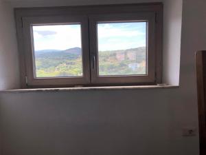 a window in a room with a view at La Musica del Vento in Aggius