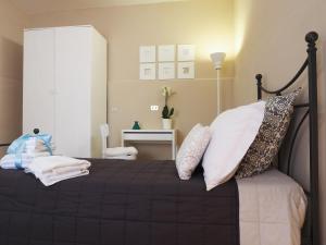 A bed or beds in a room at Domus Tua
