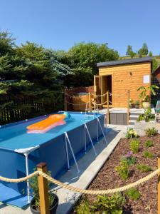 Πισίνα στο ή κοντά στο U Haliny Pokoje Stasikówka - Poronin