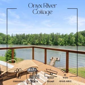 a view of the water from the deck of river cottage at River Lofts - Onyx & Catawba Cottages in Hickory