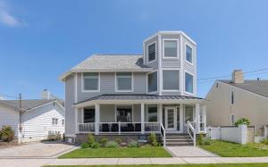 a large white house with a porch at 309 E Jefferson Ave in Wildwood Crest