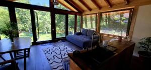 a living room with a couch and a table at Studio Belvedere in Mălăeşti