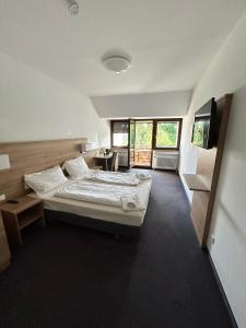 Katil atau katil-katil dalam bilik di Hotel Allee 25