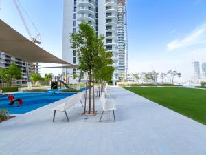 Πισίνα στο ή κοντά στο Palm Jumeirah 1BR - Beach, Pool & Atlantis Views