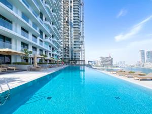 Πισίνα στο ή κοντά στο Palm Jumeirah 1BR - Beach, Pool & Atlantis Views