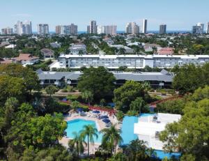 an aerial view of the resort with the city in the background at Park Shore Resort Deluxe Condo, water views 232 in Naples