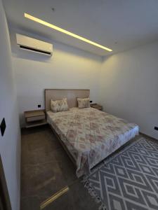 Ένα ή περισσότερα κρεβάτια σε δωμάτιο στο luxury apartments