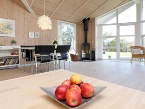 a plate of fruit on a table in a living room at Luxury Retreat in Vorupor - By Traum Ferienwohnungen in Nørre Vorupør