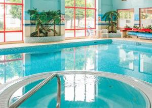 a pool in a hotel room with a swimming pool at The Glen Getaway in Dunbar