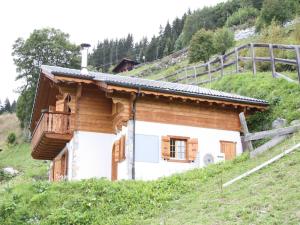 a house on the side of a hill at Chalet in Rhone Valley near Ski Lift in Les Collons