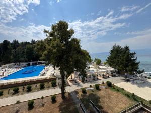 an aerial view of a resort with a swimming pool at Park Elysee Lakefront Premium Apartment in Ohrid
