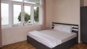 Ένα ή περισσότερα κρεβάτια σε δωμάτιο στο villas for rent in Muine Vietnam