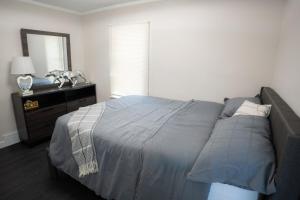 Ένα ή περισσότερα κρεβάτια σε δωμάτιο στο Modern Luxury House - Birmingham +3 φωτογραφίες