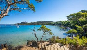 a view of a river with boats in the water at Magnifique appartement proche de la plage in Hyères