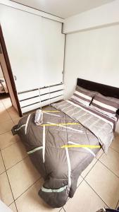 Ένα ή περισσότερα κρεβάτια σε δωμάτιο στο Hermoso Apartamento Miraflores Central +12 φωτογραφίες