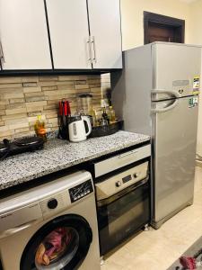 O bucătărie sau chicinetă la Golf Porto Marina Alamein North Coast VIP2Bedroom