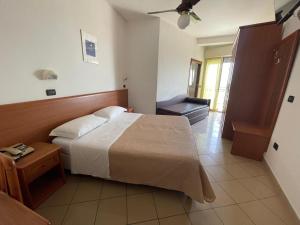 Postel nebo postele na pokoji v ubytování Hotel Trocadero - Koolibry Hotels