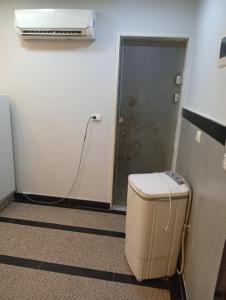 a room with a heater and a room with a door at ميراج باي اكوا بارك in Hurghada +2 photos