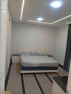a bedroom with a bed in a room at ميراج باي اكوا بارك in Hurghada