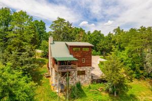 an aerial view of a house in the woods at Smokies Serenity by American Patriot Getaways in Union Grove
