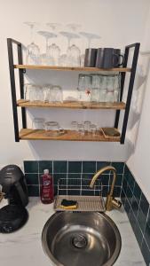 a kitchen counter with a sink and a sink at Le panier à vos pieds in Marseille +39 photos