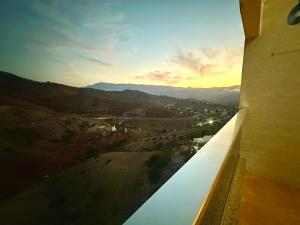 a view of a valley from a window of a building at Apartamentos Al Borj 3J إقامة البرج in Ifargane