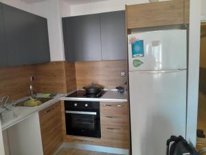 Η κουζίνα ή μικρή κουζίνα στο NLogo Prime Residency