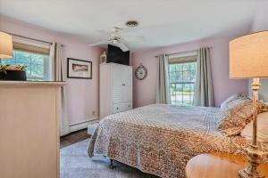 Ένα ή περισσότερα κρεβάτια σε δωμάτιο στο Riverview Retreat