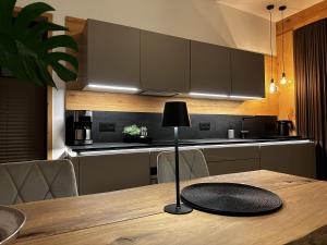 Η κουζίνα ή μικρή κουζίνα στο Loft N 39 - ekskluzywny apartament pod Zamkiem w Mosznej