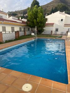 The swimming pool at or close to Alma de Cómpeta