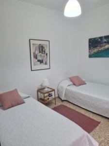 Ένα ή περισσότερα κρεβάτια σε δωμάτιο στο Ático con terraza Anexa, Garachico.