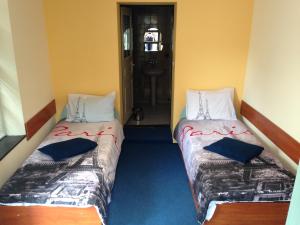 Postel nebo postele na pokoji v ubytování Hotel Bilyana