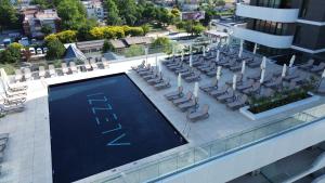 an overhead view of a swimming pool on a building at SIA in Odyssey Pool & Spa Resort in Năvodari